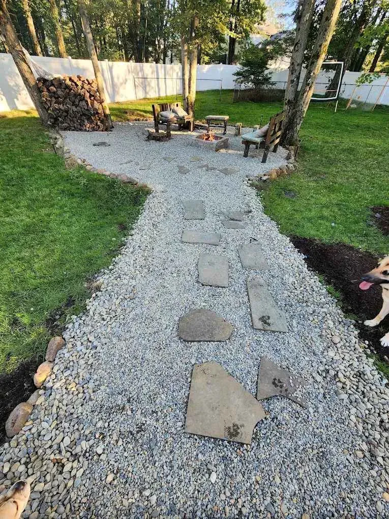 Visual comparison of landscaping materials such as mulch, topsoil, and gravel in bins