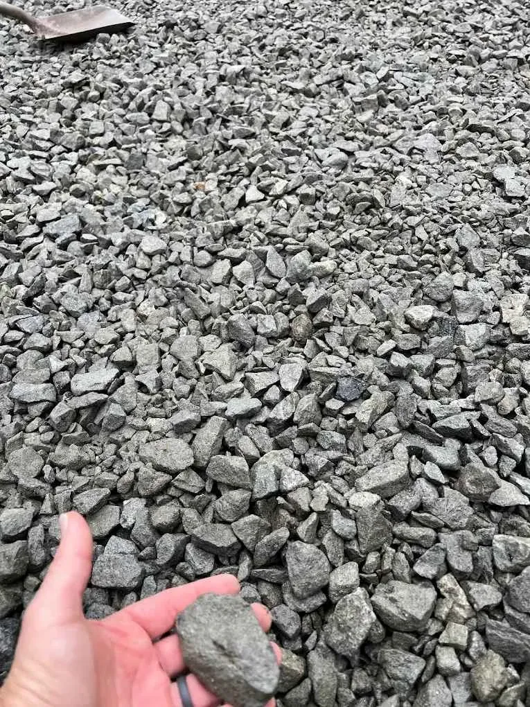 Warehouse stocked with mulch products showcasing budget-friendly offerings, emphasizing cost-effective landscaping solutions.